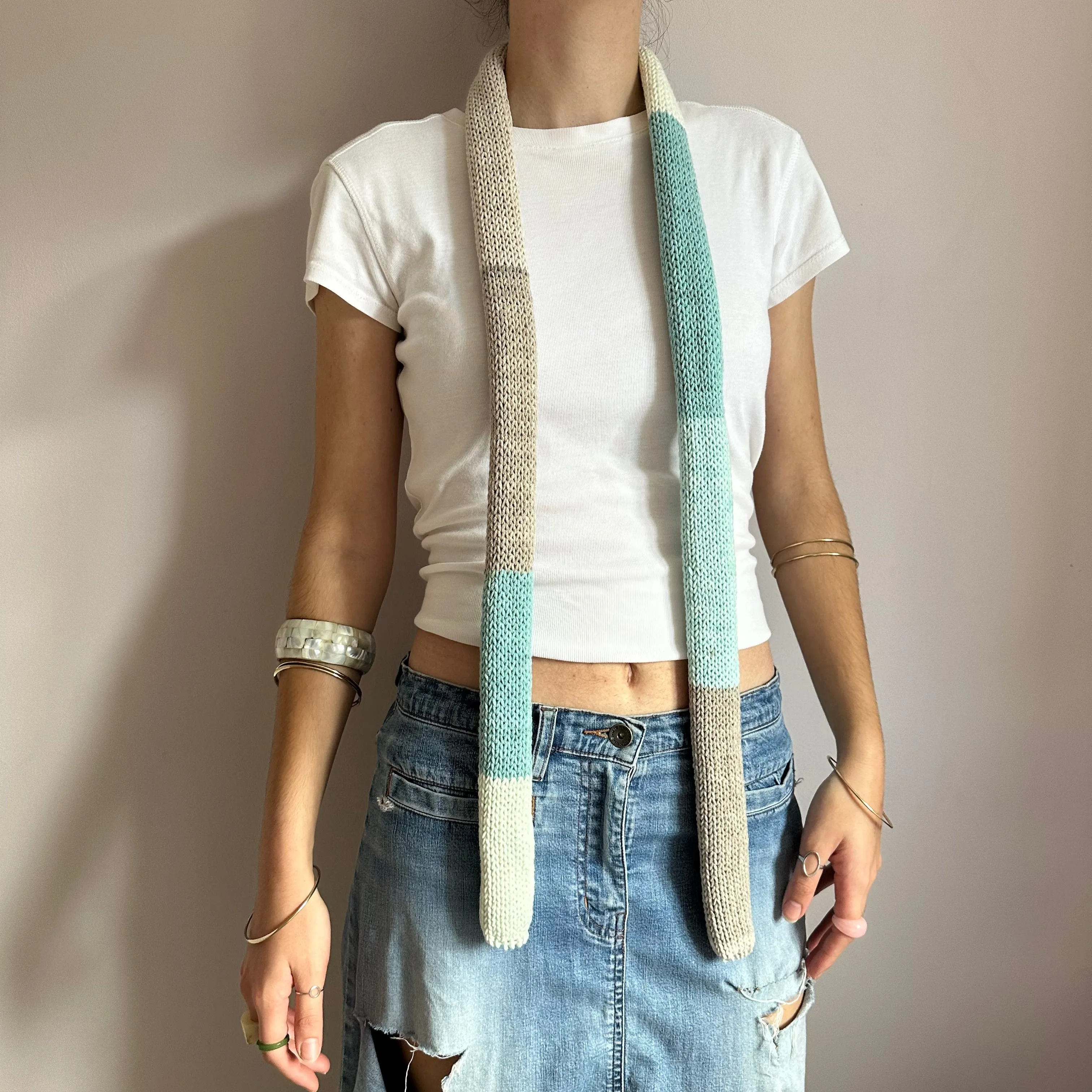 Handmade knitted colour block skinny scarf in baby blue, cream and beige