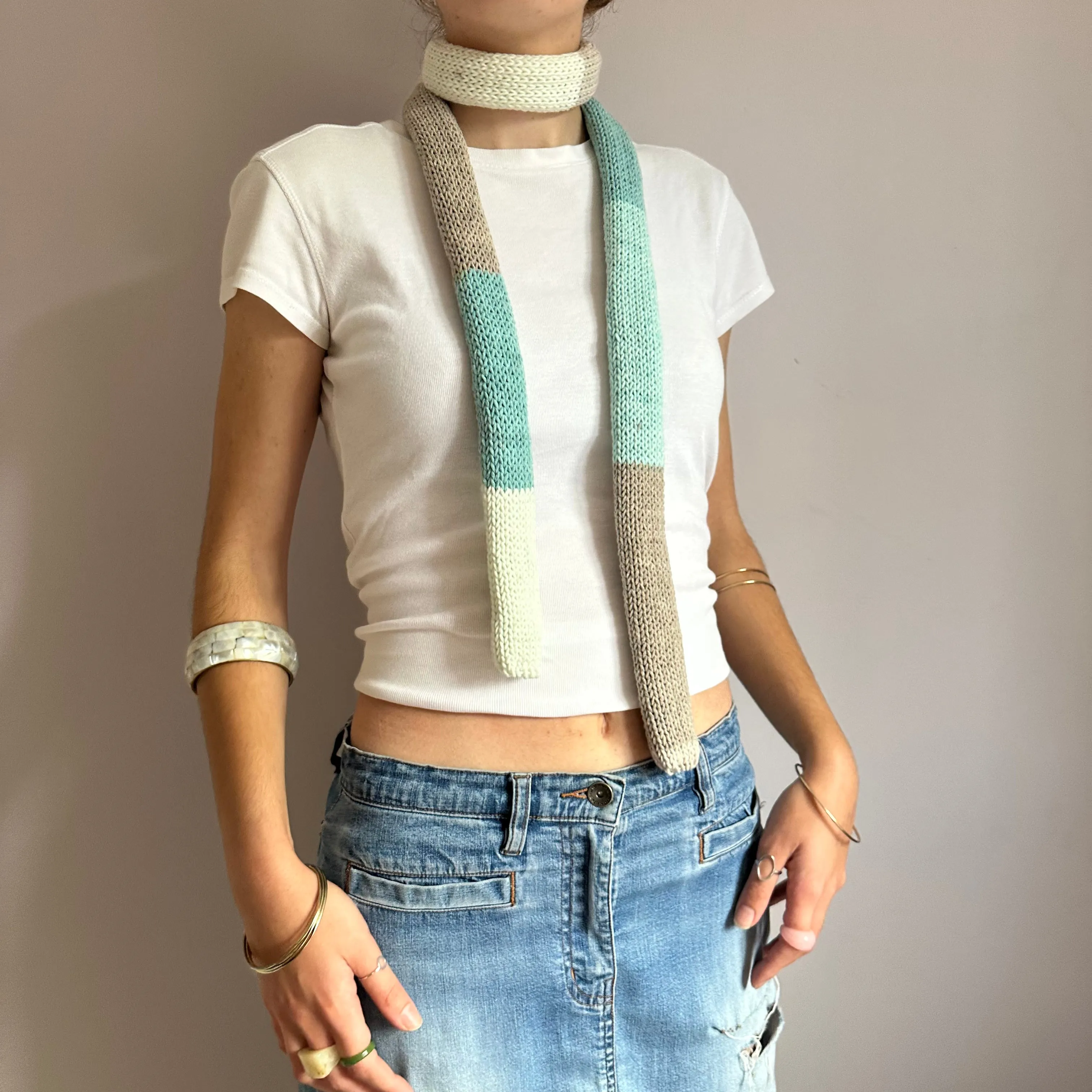 Handmade knitted colour block skinny scarf in baby blue, cream and beige