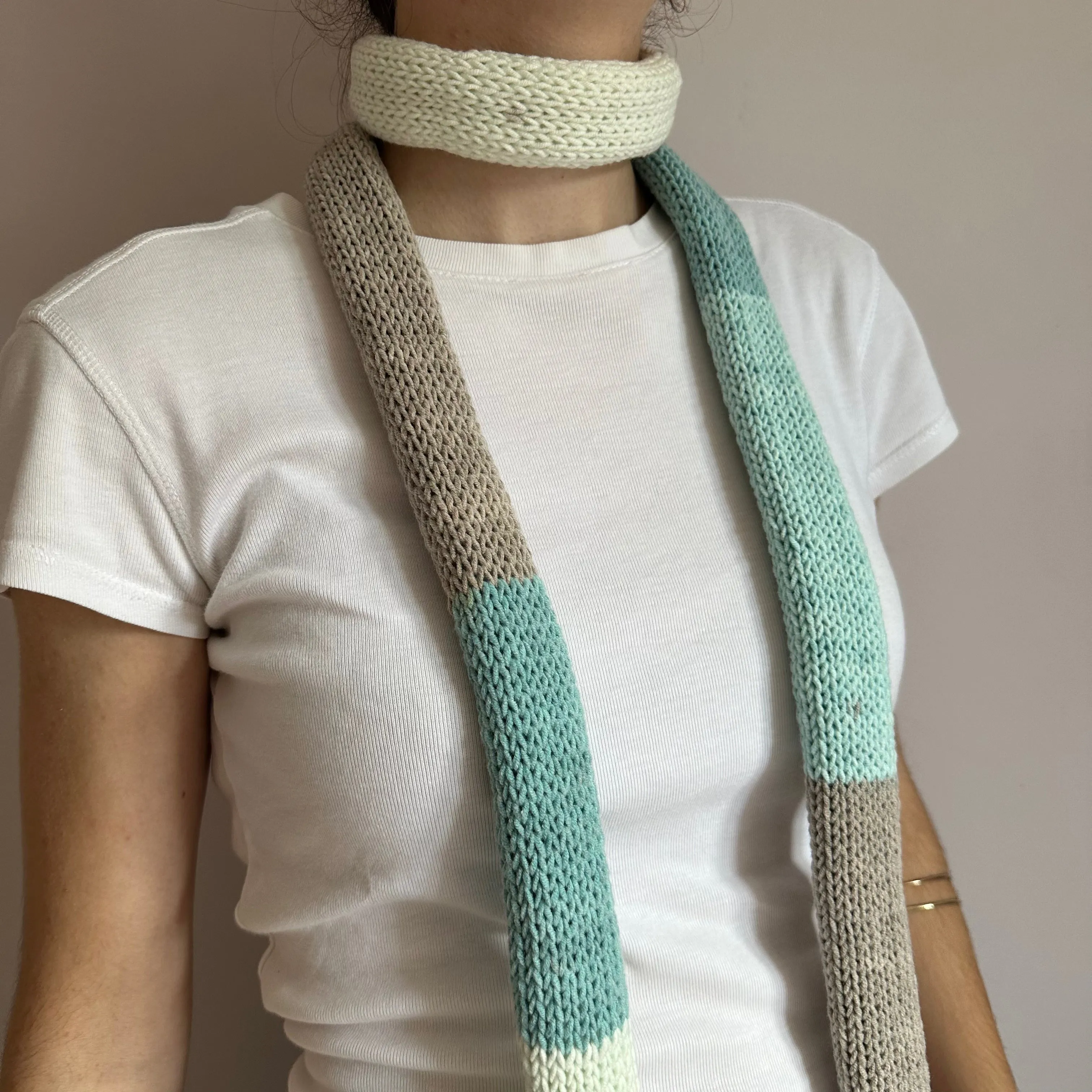 Handmade knitted colour block skinny scarf in baby blue, cream and beige