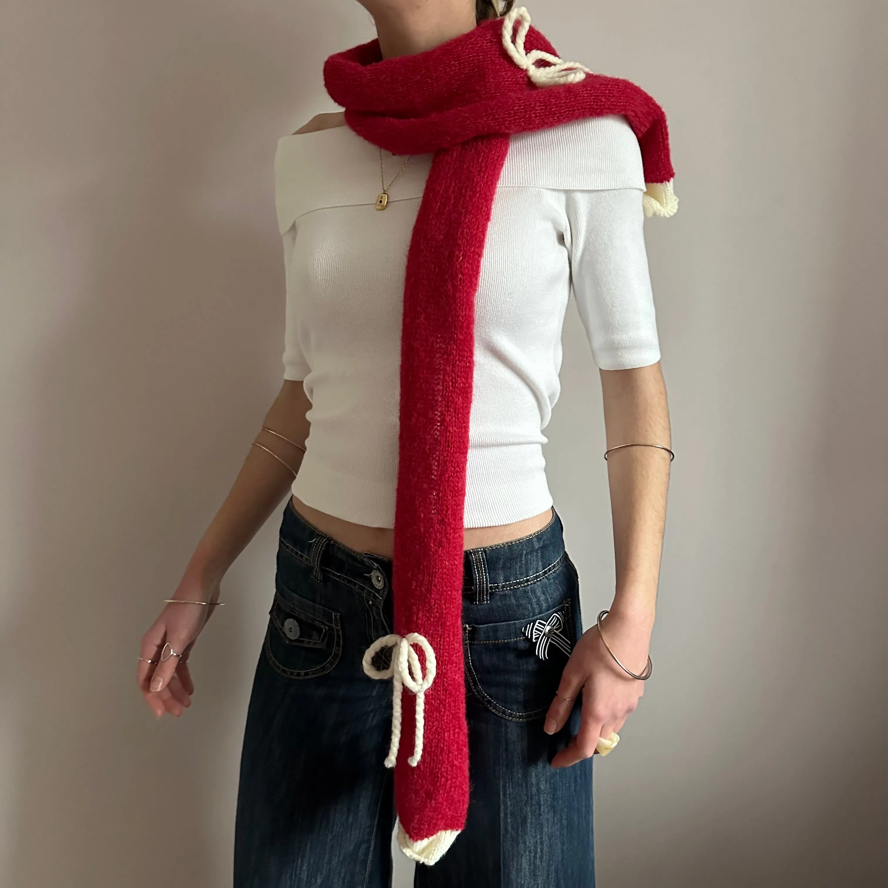 Handmade knitted red and cream mohair bow scarf