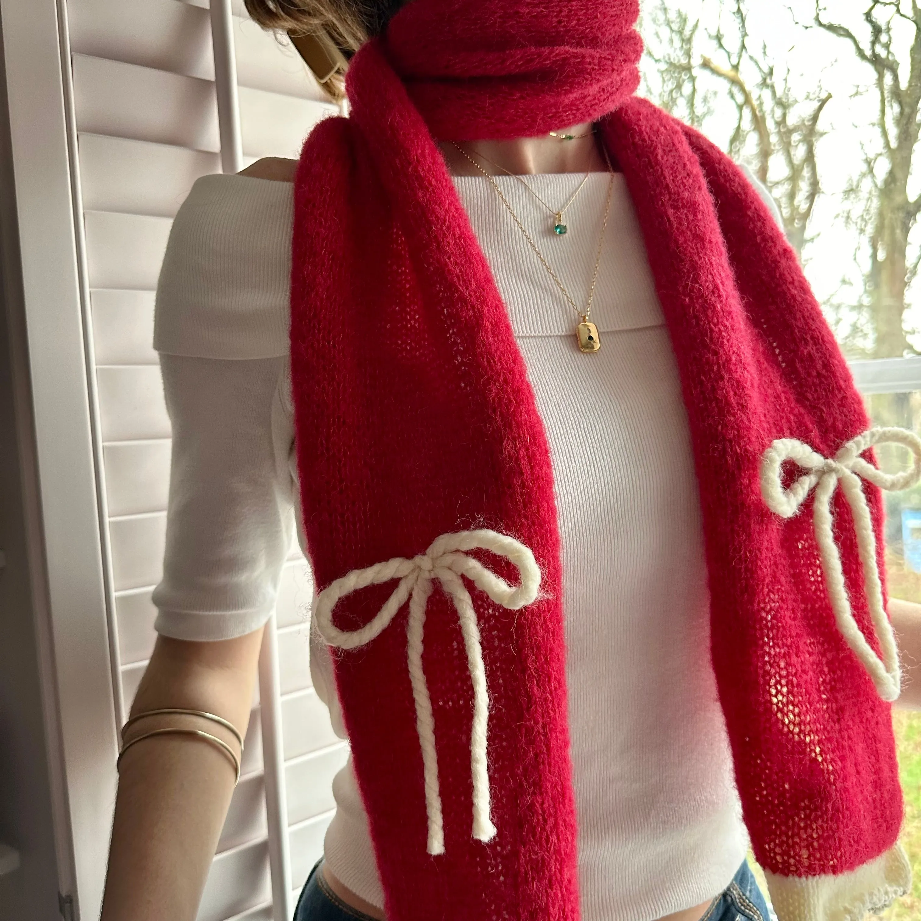 Handmade knitted red and cream mohair bow scarf