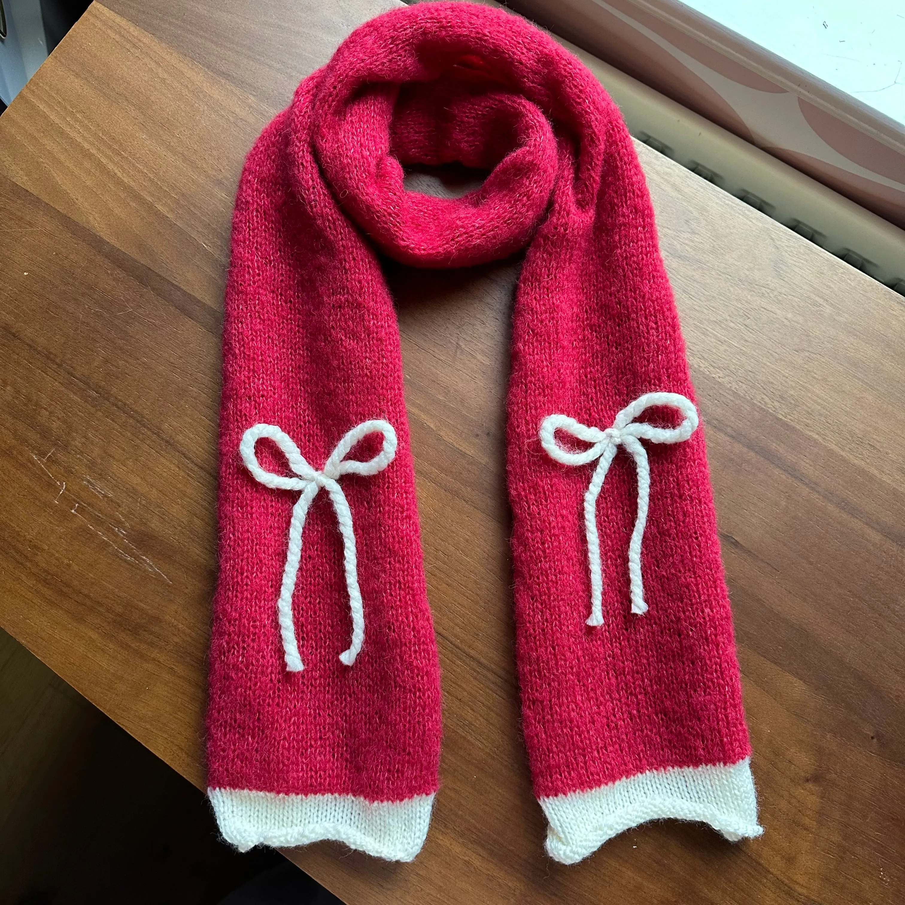 Handmade knitted red and cream mohair bow scarf