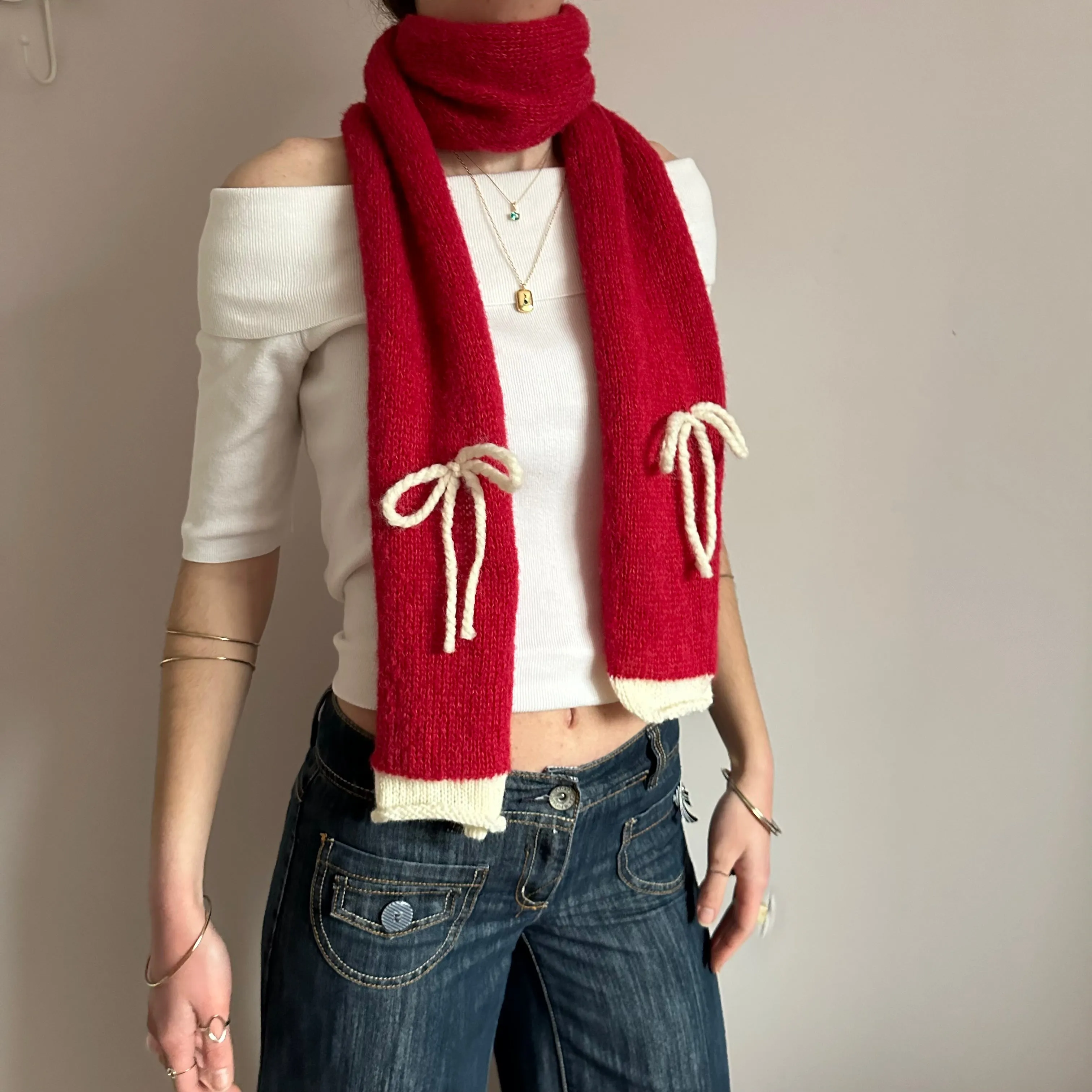 Handmade knitted red and cream mohair bow scarf