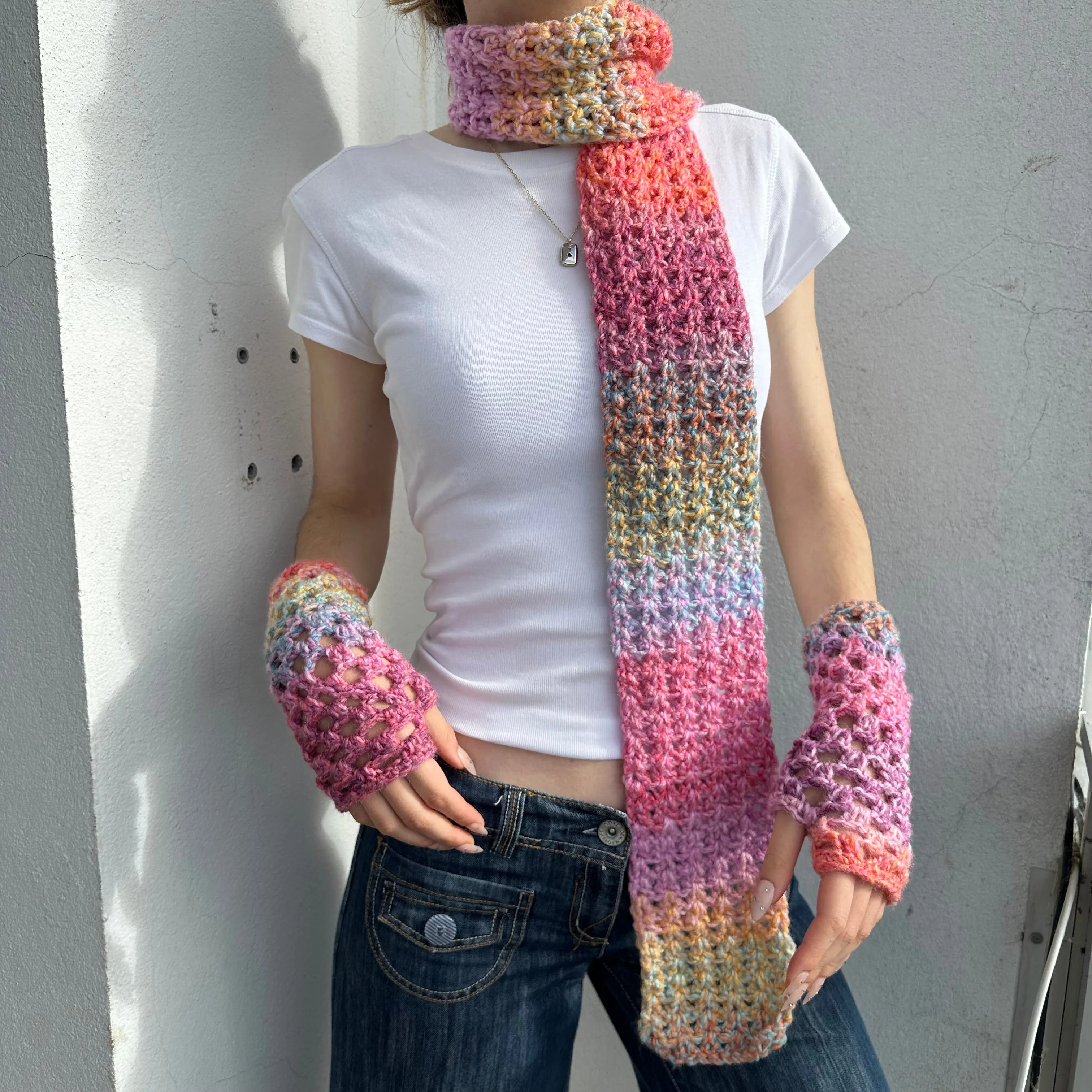 Handmade multicoloured ombré crochet scarf in pink, purple, orange and yellow